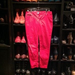 Bright red skinny jeans